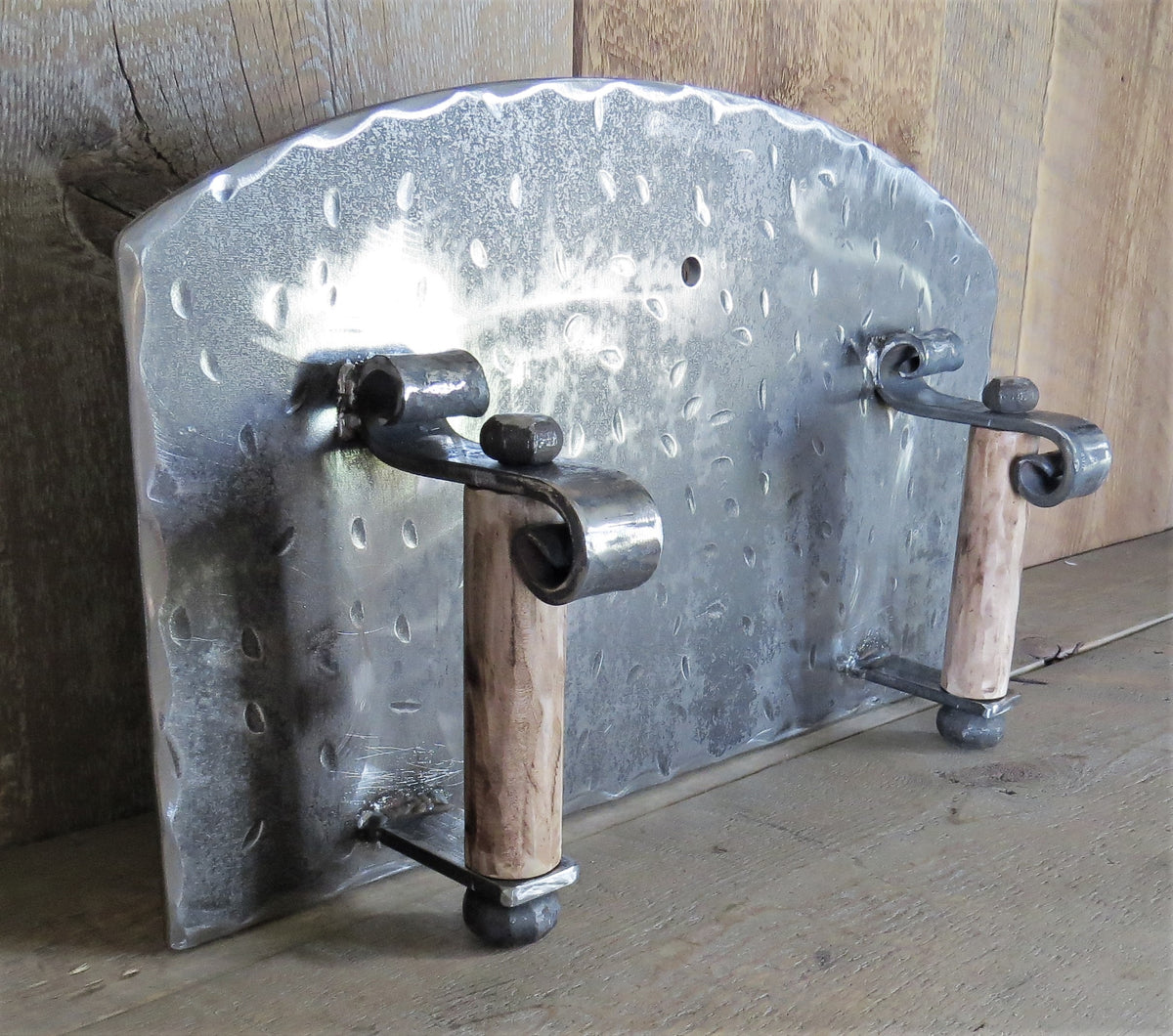 http://www.oldwestiron.com/cdn/shop/products/arched-freestanding-pizza-bread-oven-door_1200x1200.jpg?v=1609546911