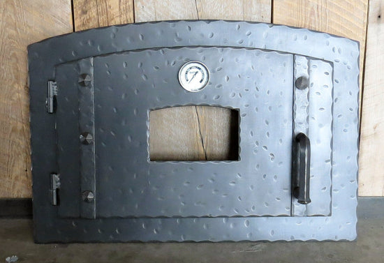 hammered iron pizza oven door with window and thermometer and 4 sided jamb