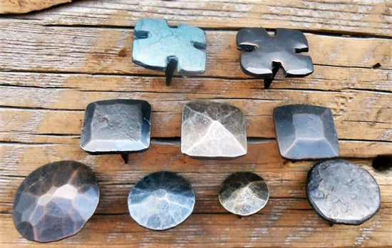 A decorative rustic nail (clavo), commonly used for vintage-style furniture and woodworking